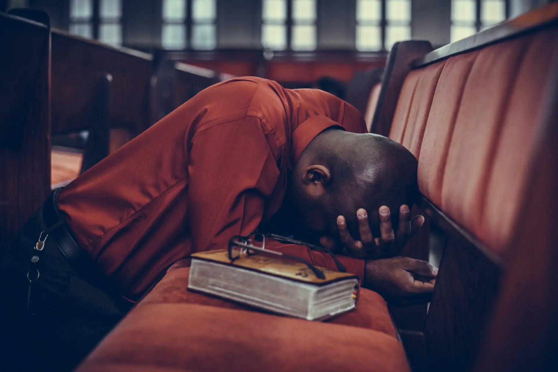 Man kneeling praying for revival