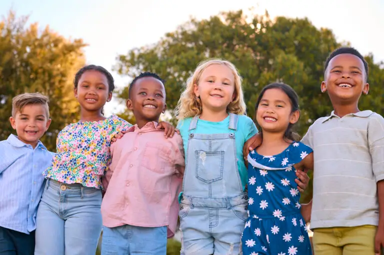 Elementary school children standing outdoors