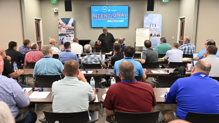 Robert Smith Jr. speaks to a group of men at the Alabama Baptist SBOM